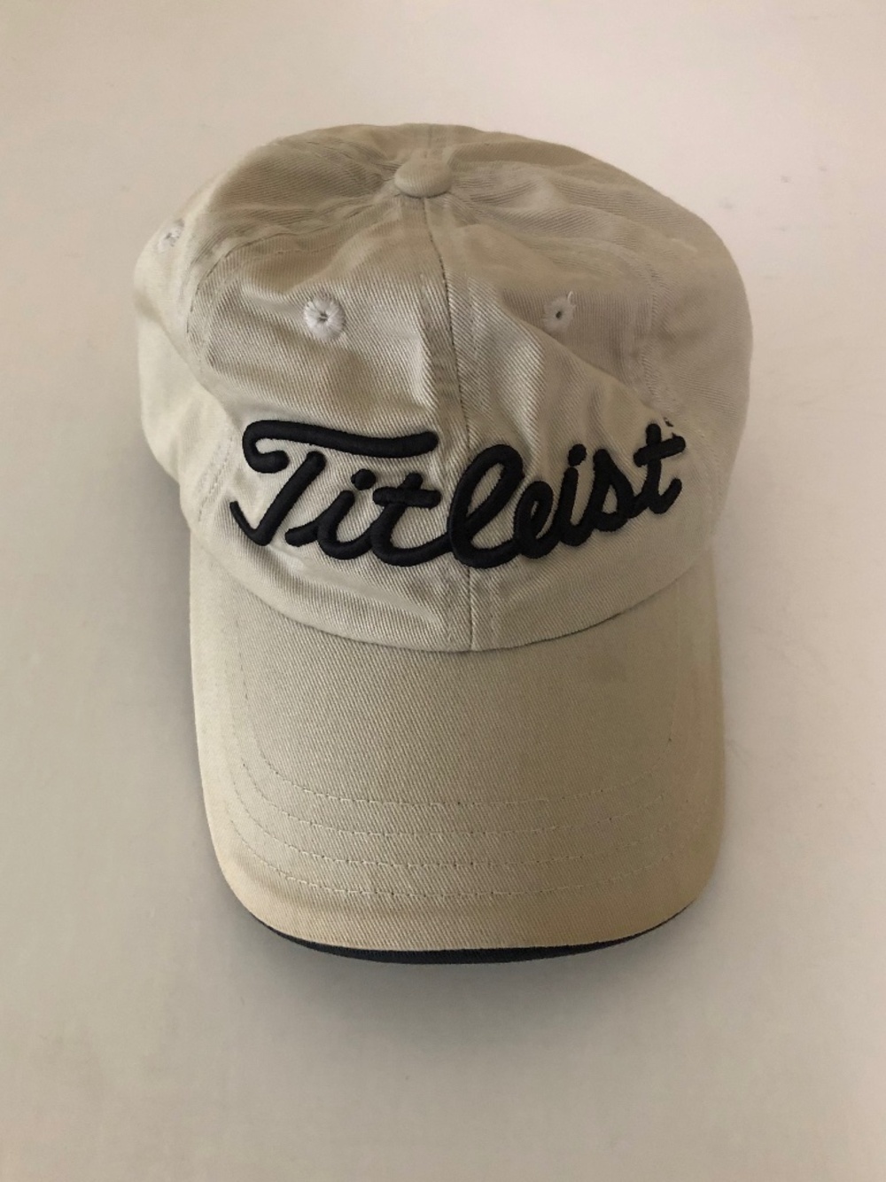 Titleist golf hat one size tan black Velcro adjustable size strap